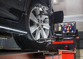 What happens during a wheel alignment?